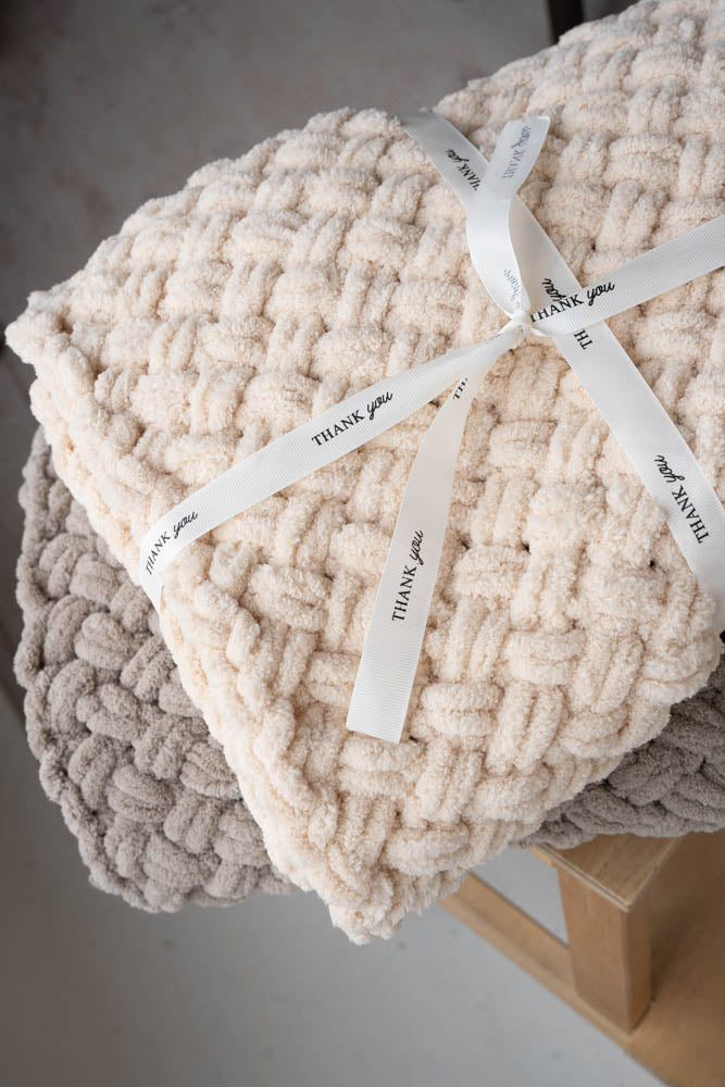 Crossed plüss takaró